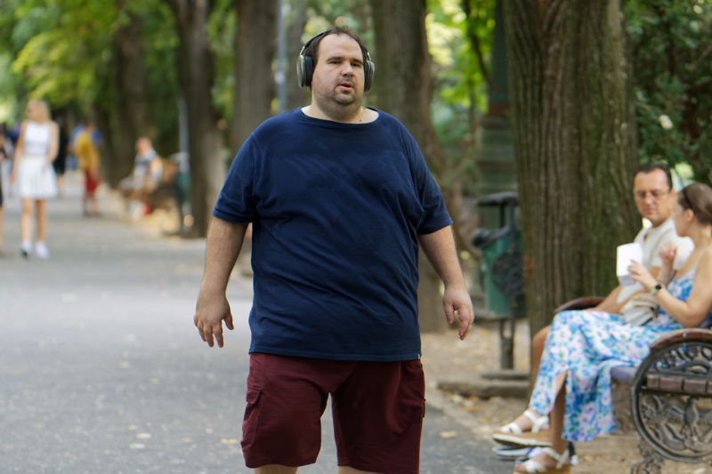 Thick man walking